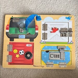 Melissa & Doug Interactive Latches Board - Red, Blue, White